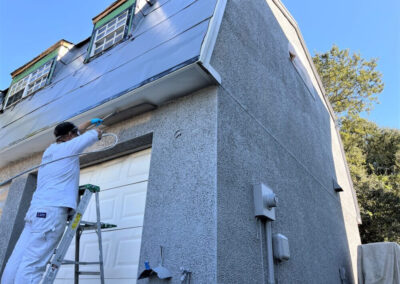 Exterior house painting in St. Augustine, shell surface