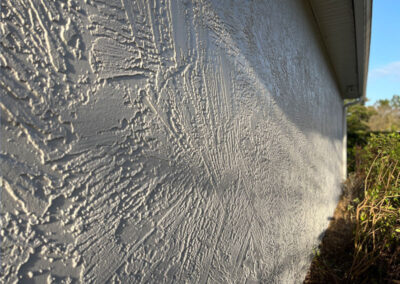 White textured exterior wall painting