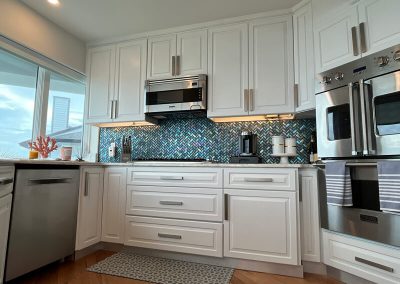 White painted kitchen cabinet by Multicolor Paint in 2022