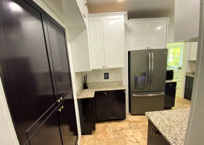 Black and White repainted Kitchen cabinet by Localpainter Florida