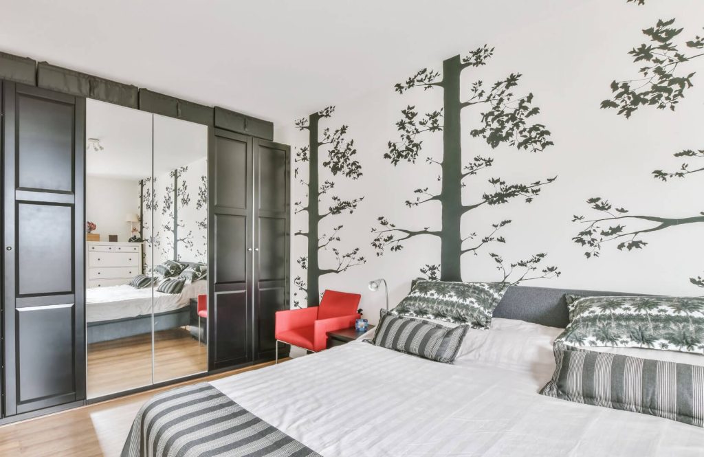 Wallpapered wall in bedroom