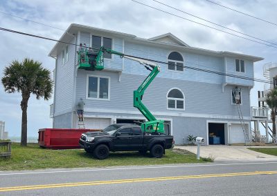 Exterior house painting in process