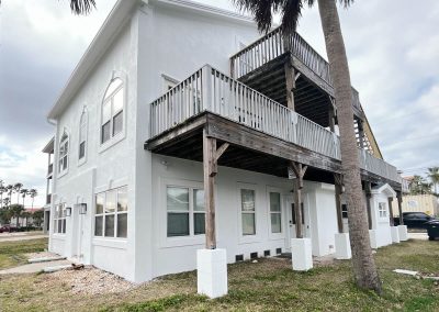 Painting a white house at the beach - local paniter Florida